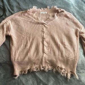 Pink sweater with fringe